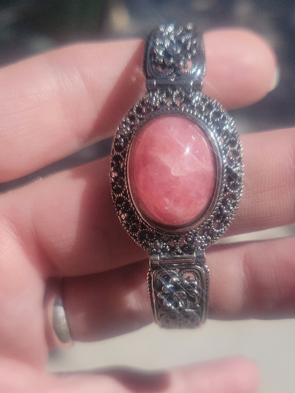 Highvquality rhodocrosite gem quality braclet silver over copper braclet.